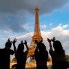 students next to Eiffel Tower