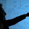  Pranavesh Panakkal, a postdoctoral researcher in civil and environmental engineering, analyzes data in Houston that senses road conditions during a flood situation.
