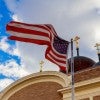 American flag and church
