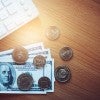 Picture of bill and coins.