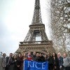 Rice MGA students in Paris, France in front of the Eiffel Tower