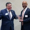 President DesRoches being presented an award