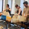 Rice University students and staff came together to pack care packages for refugees in Houston, offering essential supplies and a message of welcome and support.