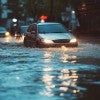 stock photo of car driving in flash flooding
