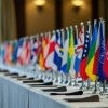 world flags on conference table