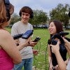 Students from the Houston Newsroom test out their new equipment.