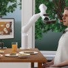 AI-generated image of man assisted by brain-computer interface 