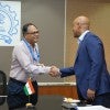 Reginald DesRoches shaking hands with IIT Bombay leader