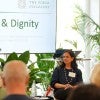 Amy Dittmar seated for a panel discussion with two other experts 
