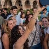 New masters students taking a selfie at Rice University. 